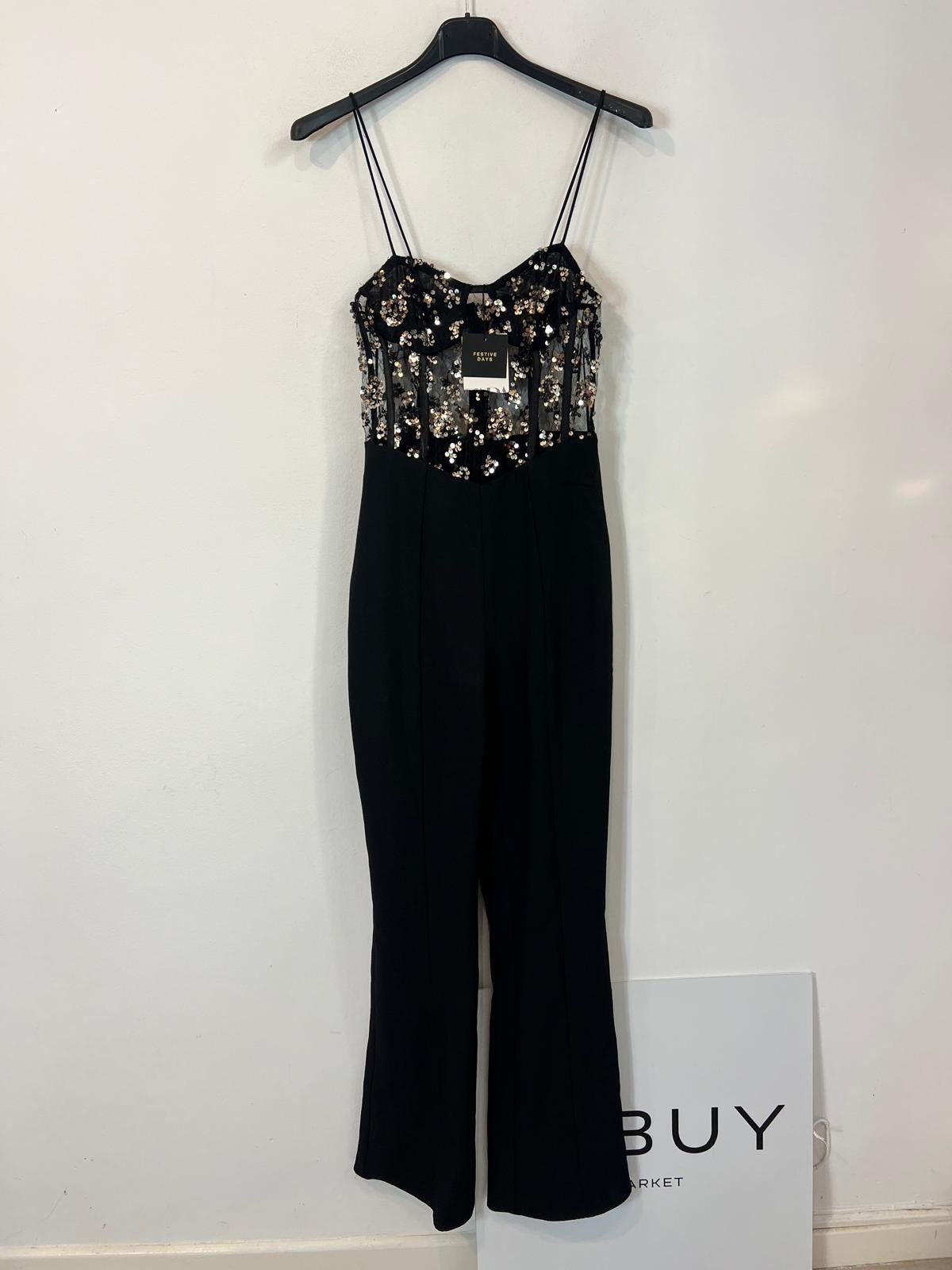 ZARA. Mono negro lentejuelas