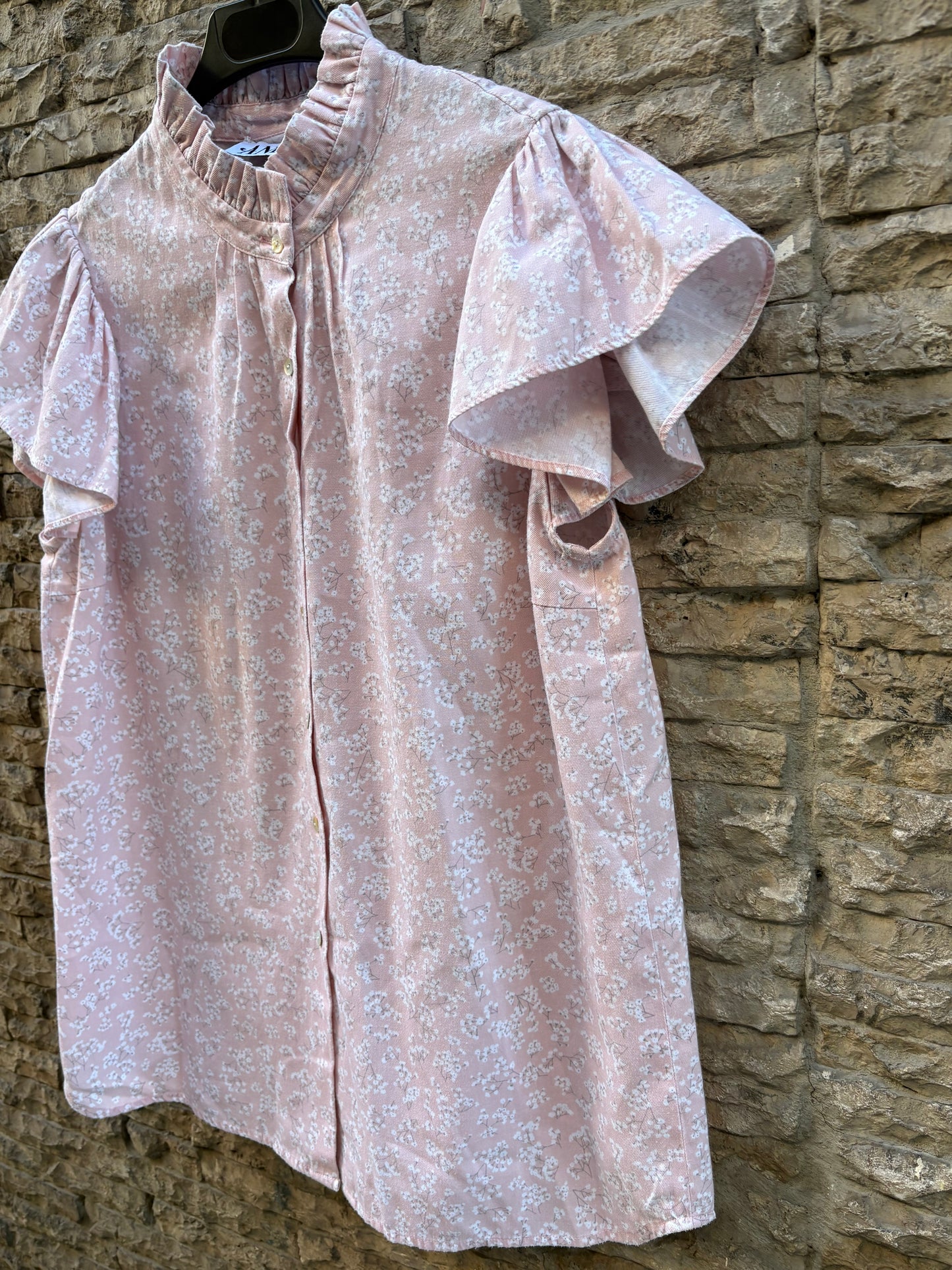 ANDION. Blusa tono pastel flores