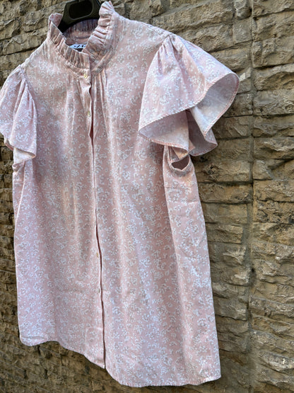 ANDION. Blusa tono pastel flores
