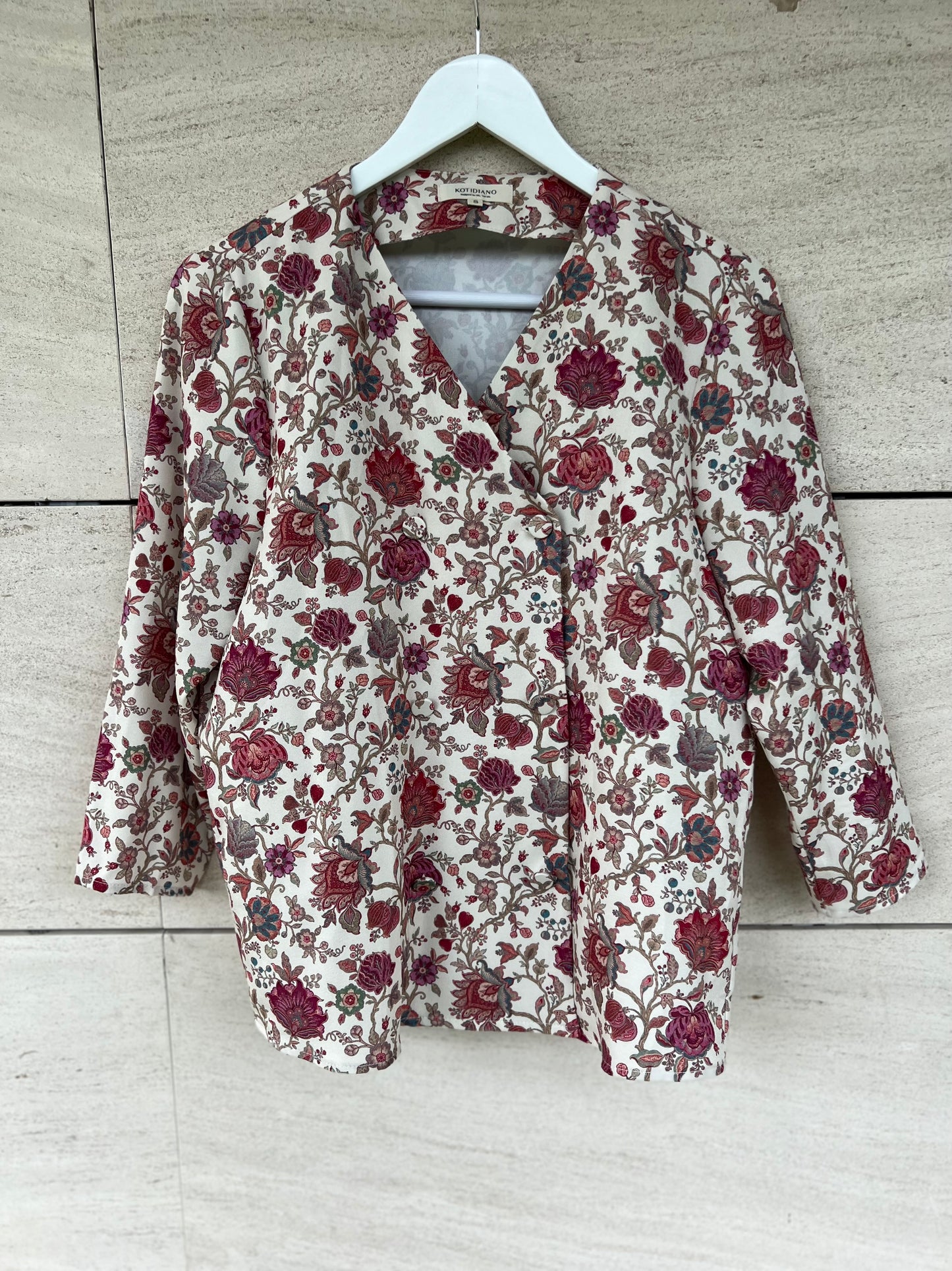 KOTIDIAN. Beige floral crossed Ts blouse