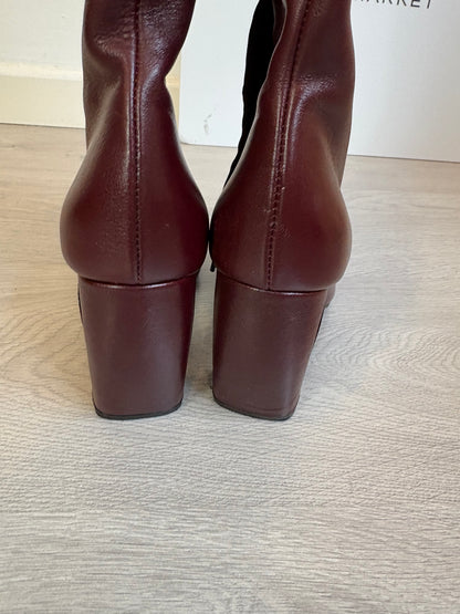 ZARA. Botas altas burdeos