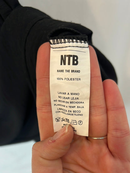 NAME THE BRAND. Black Ts bow dress