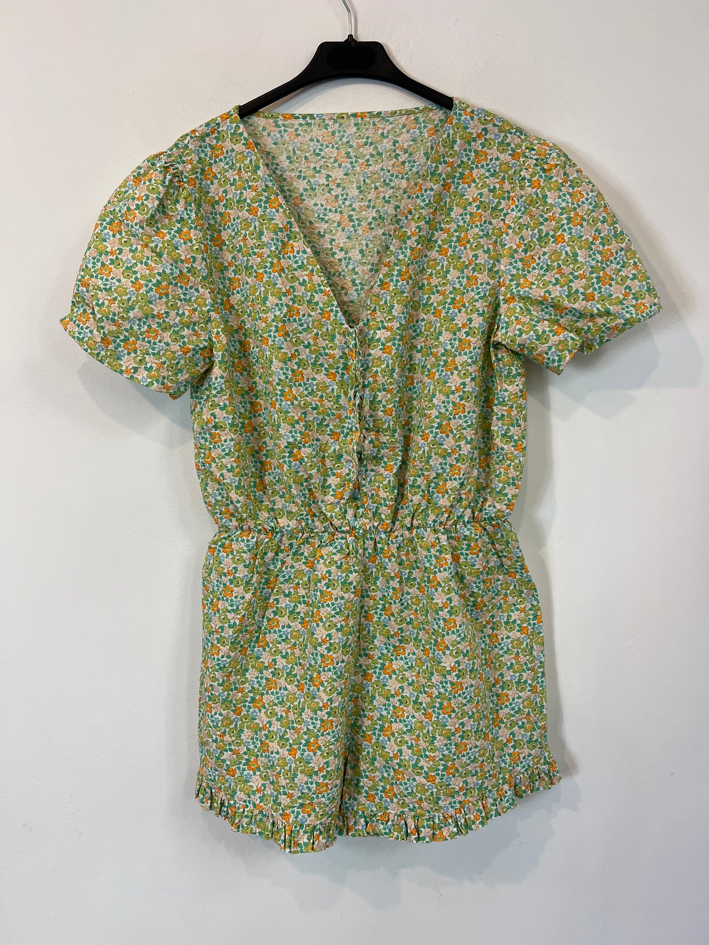 OTRAS. Mono corto flores TU(S)