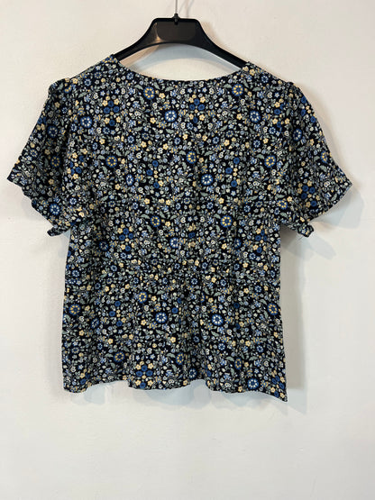 OTRAS. Top negro florecitas Tu(S)