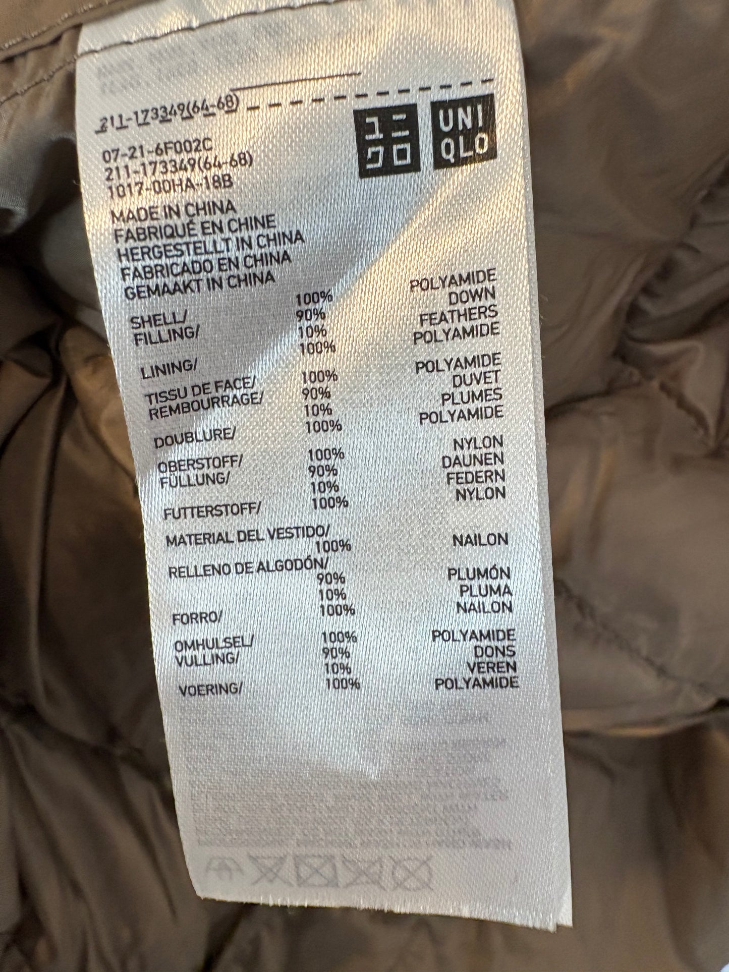 UNIQLO. Plumas sin mangas ligero marrón claro