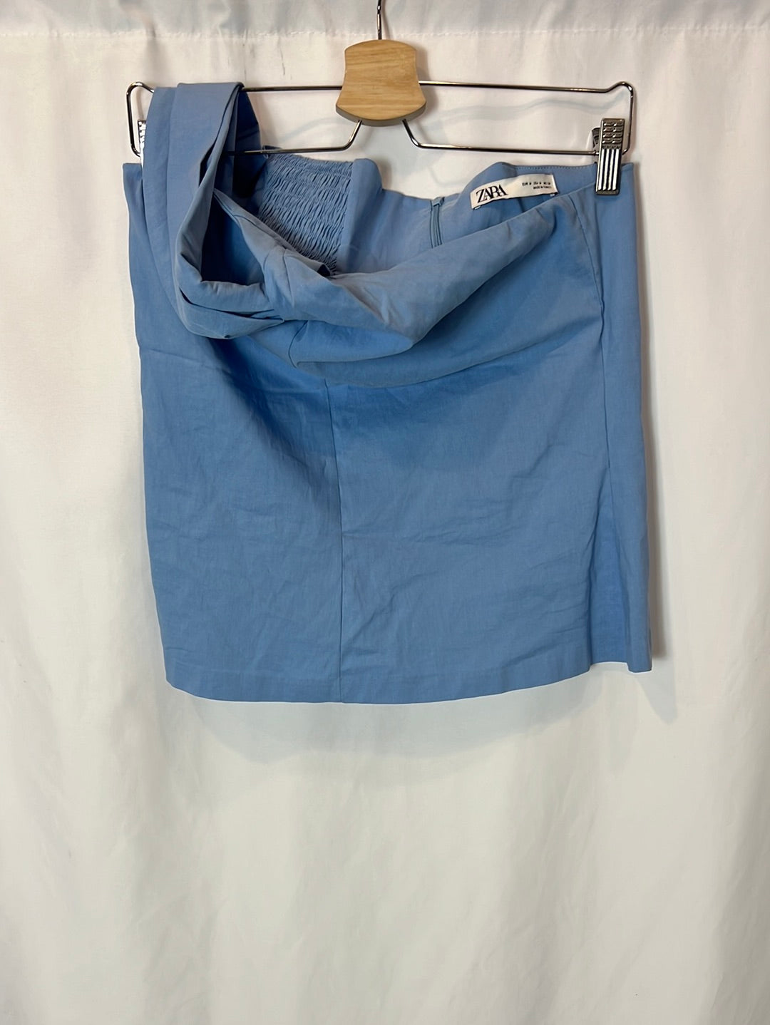 ZARA. Asymmetrical stretch blue top. TM