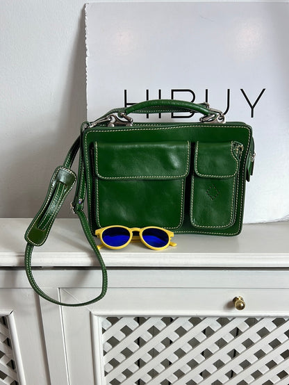 OTRAS. Bolso piel verde bolsillos