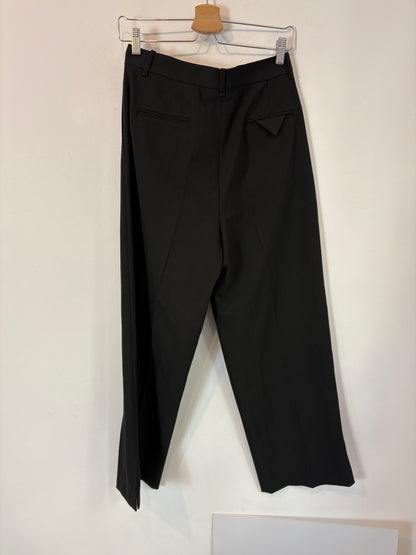 ZARA. Pantalón pinzas botón lateral