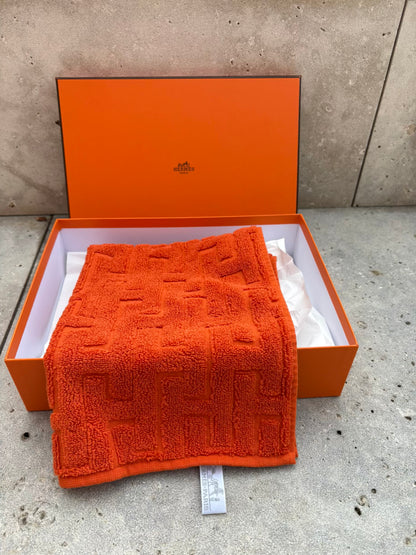 HERMES. Toalla de invitados en naranja