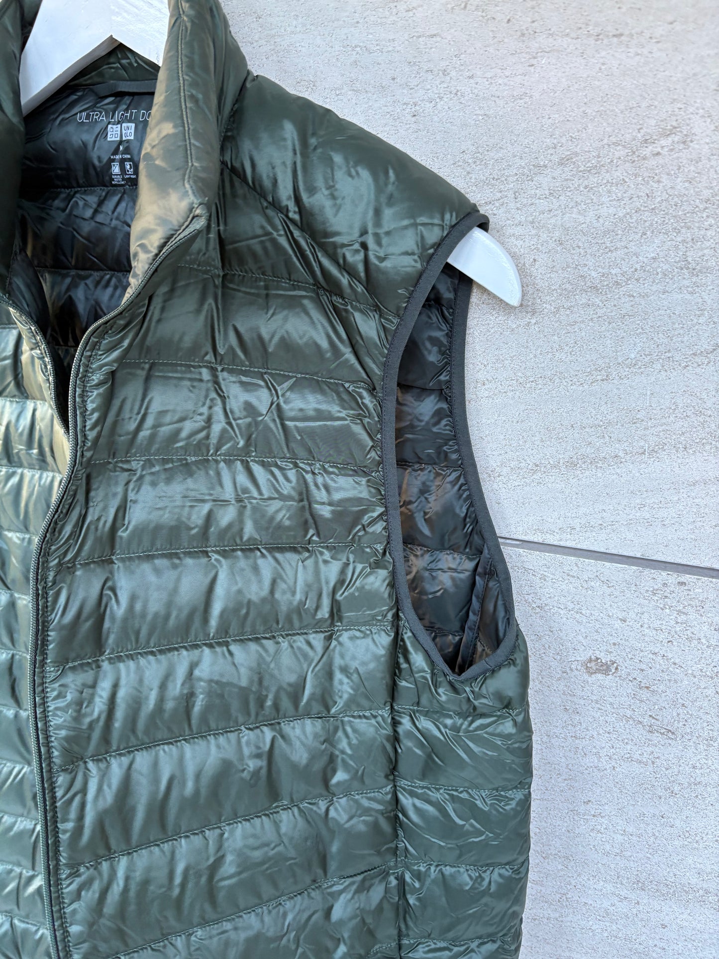 UNIQLO. Ultralight green down vest. TM