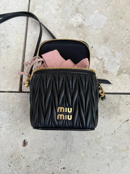 MIU MIU. Matelassé nappa leather micro bag