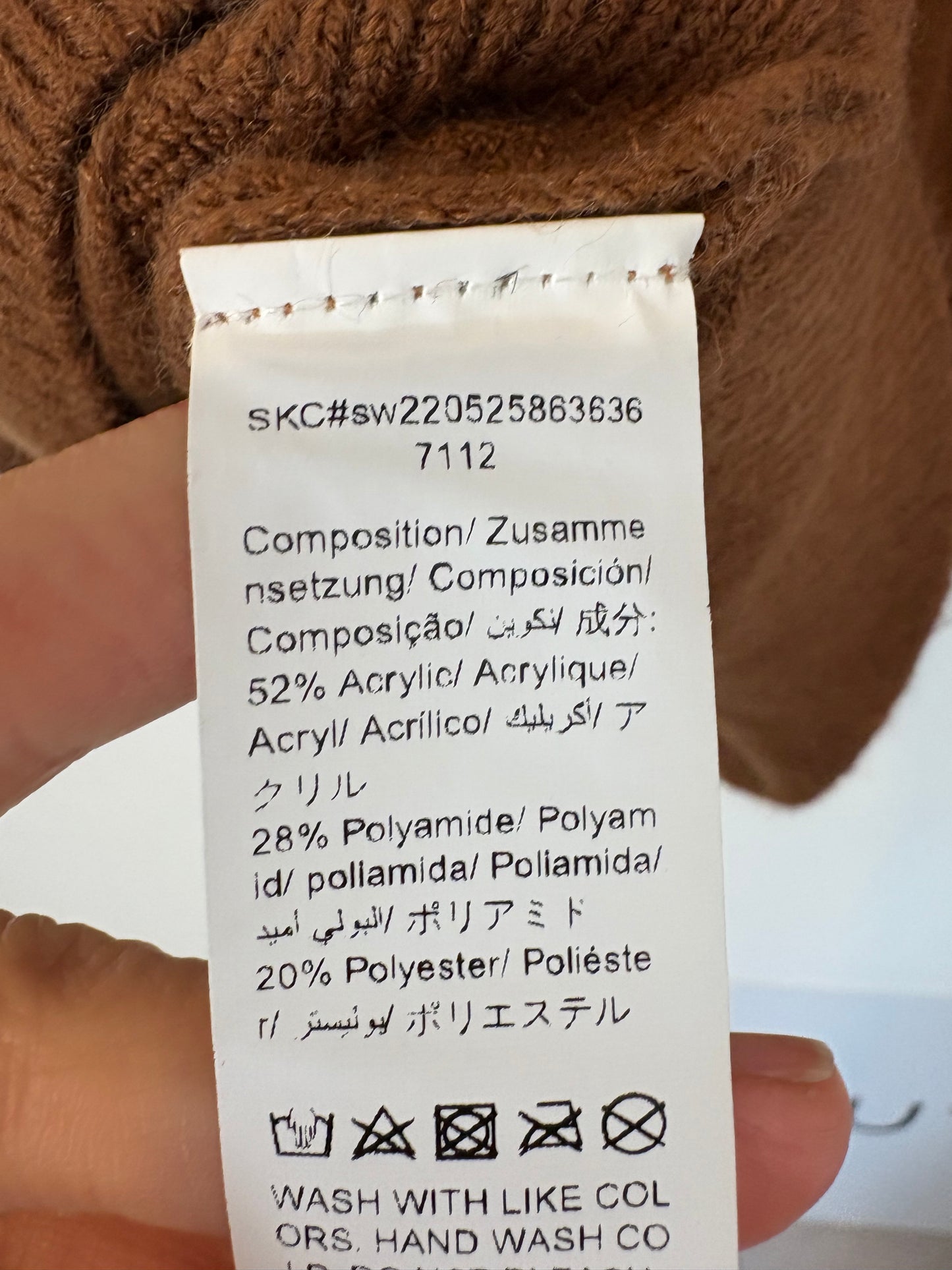 OTRAS. Jersey marrón textura