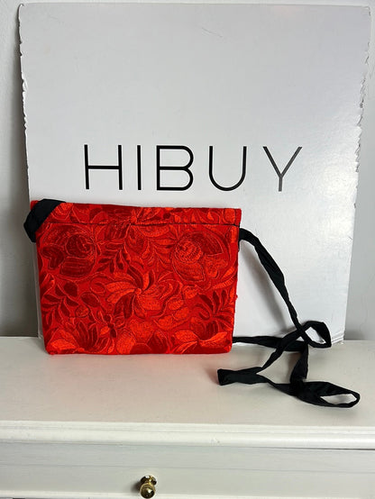 OTRAS. Bolso cartera rojo  textura