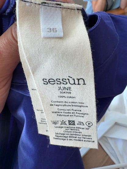 SESSÚN. Falda midi  morada abertura