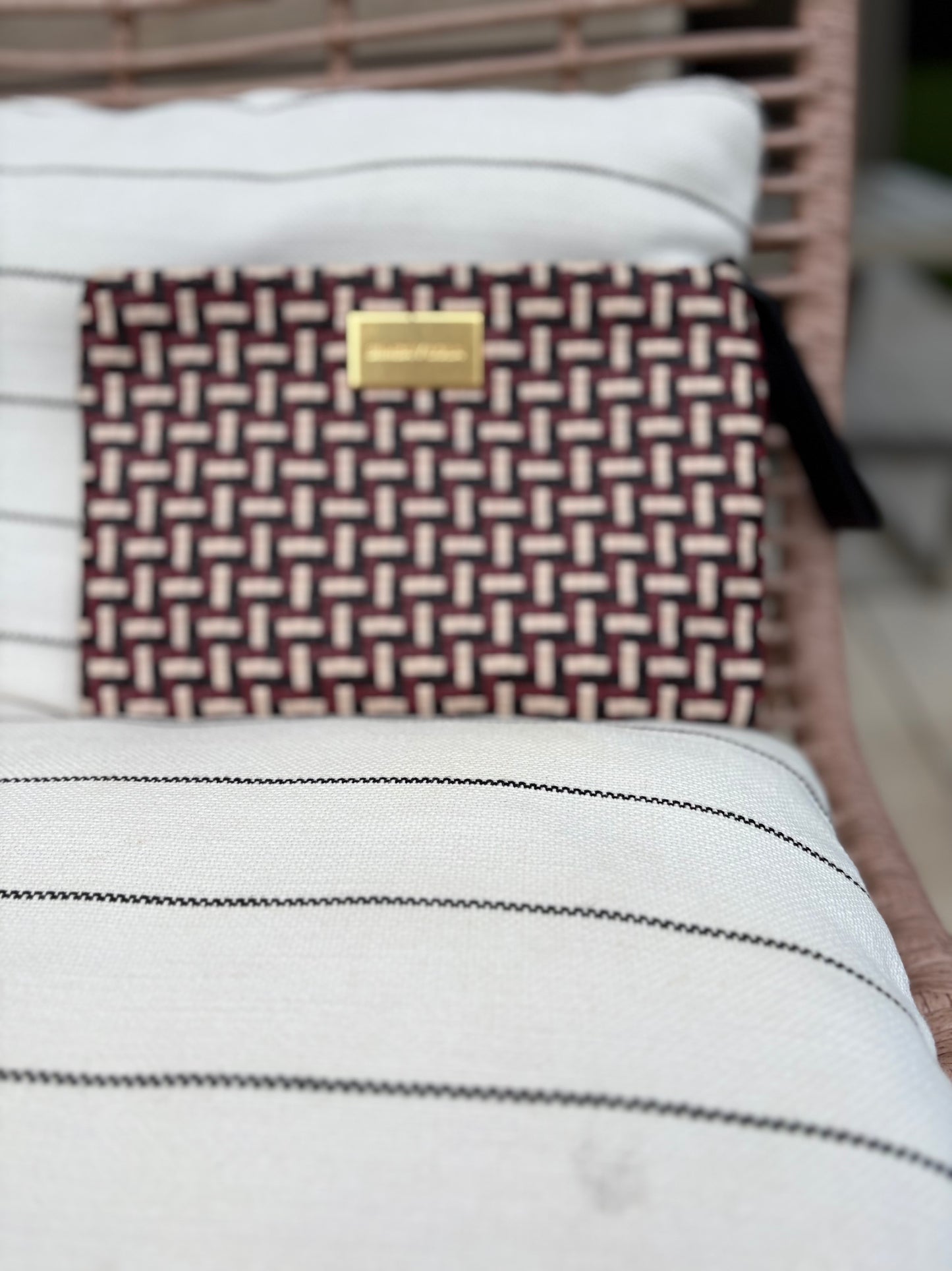 BIMBA Y LOLA. Cartera de mano trenzada