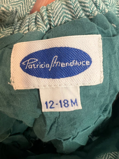 PATRICIA MENDILUCE. Ranita algodón azul claro jaspeado. T 12-18 meses