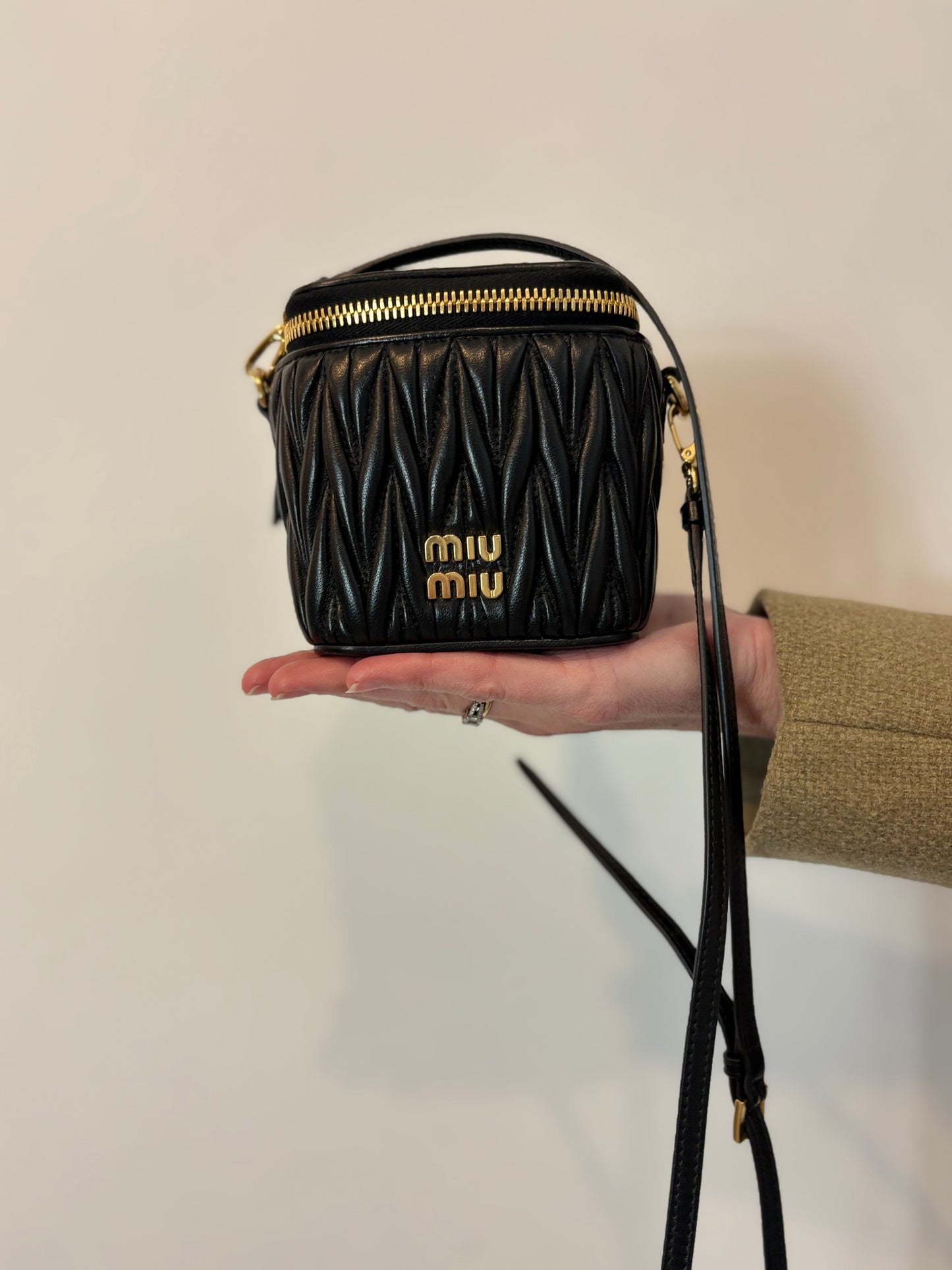 MIU MIU. Matelassé nappa leather micro bag