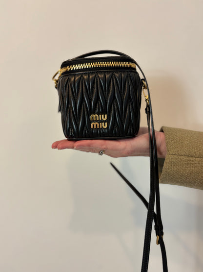 MIU MIU. Matelassé nappa leather micro bag