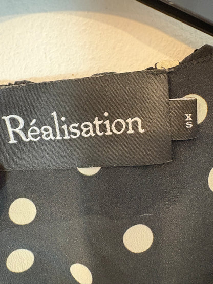 RÉALISATION. Top seda lunares ajustable en negro. T XS