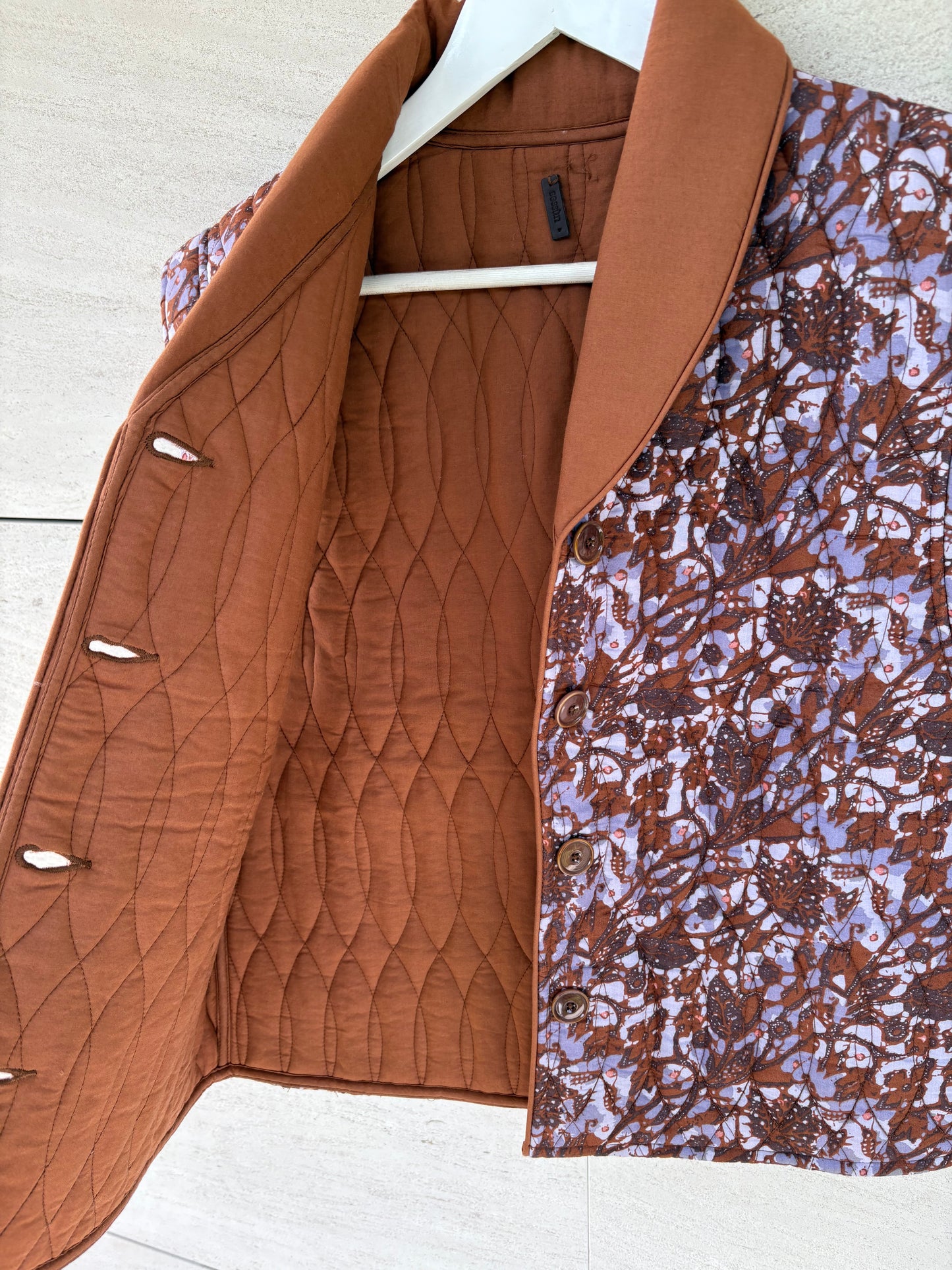 SESSÚN. Chaleco acolchado reversible