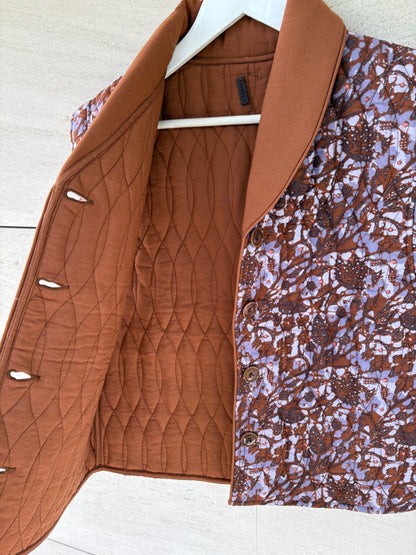 SESSÚN. Chaleco acolchado reversible