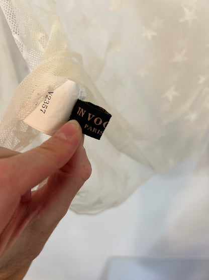 IN VOGUE.Top rejilla estrellas T.s