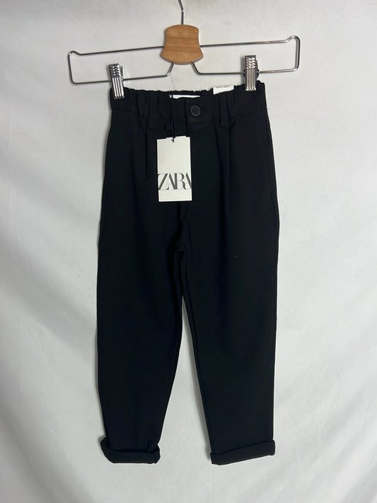 ZARA. Black chino-style fleece trousers. Size 7 years.
