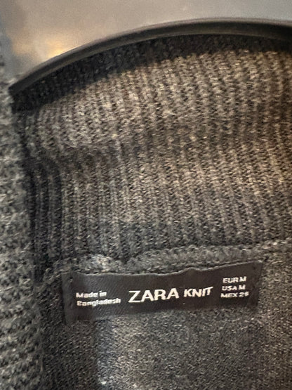 ZARA. Jersey gris jaspeado cuello vuelto