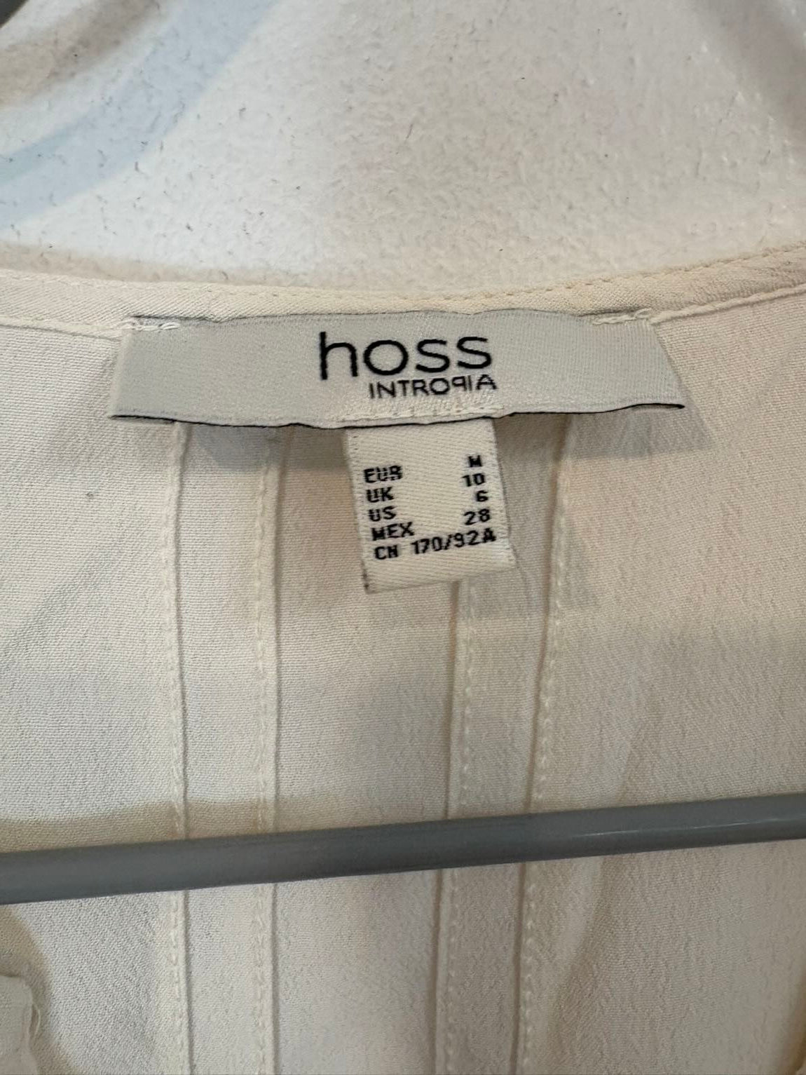 INTROPIA. Blusa beige fluida bordados