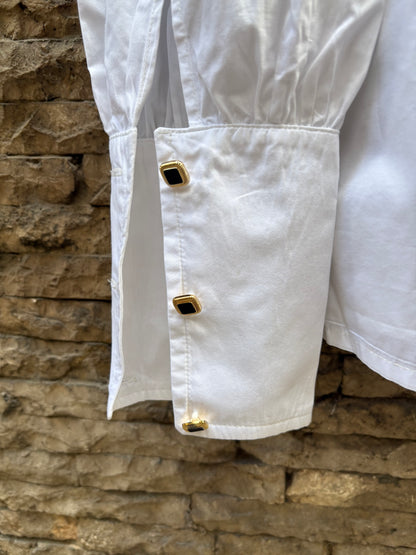 PARIS 64. White blouse with diamond buttons Ts