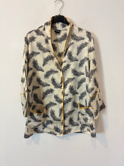 ERRE. Total look fluido estampado hojas