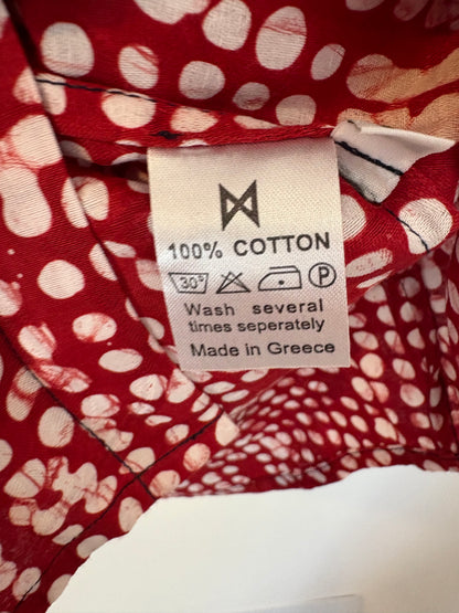 KIMALÉ. Conjunto falda y camisa roja estampada. T 36