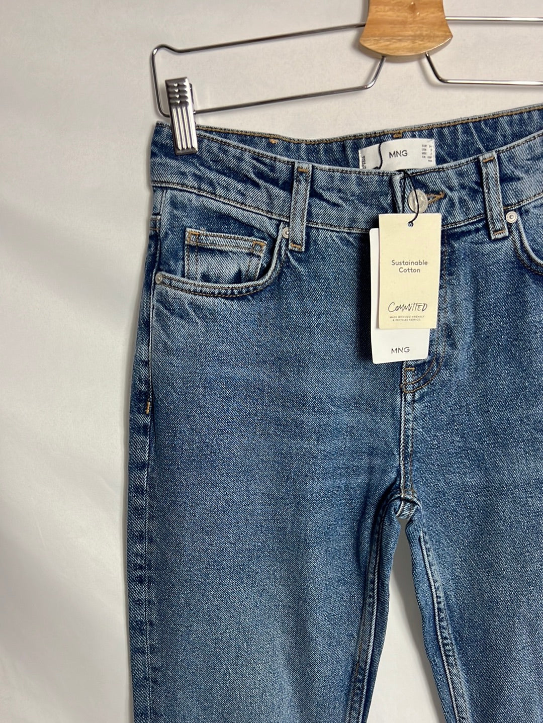 MANGO. Straight-leg jeans with slits. Size 34