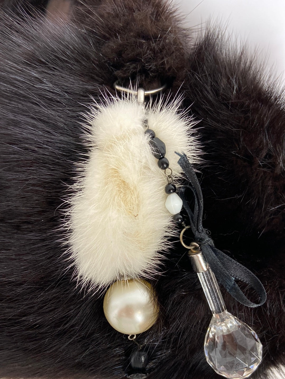 OTRAS. Bolso pelo negro