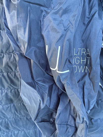 UNIQLO. Ultralight down vest in blue. XS