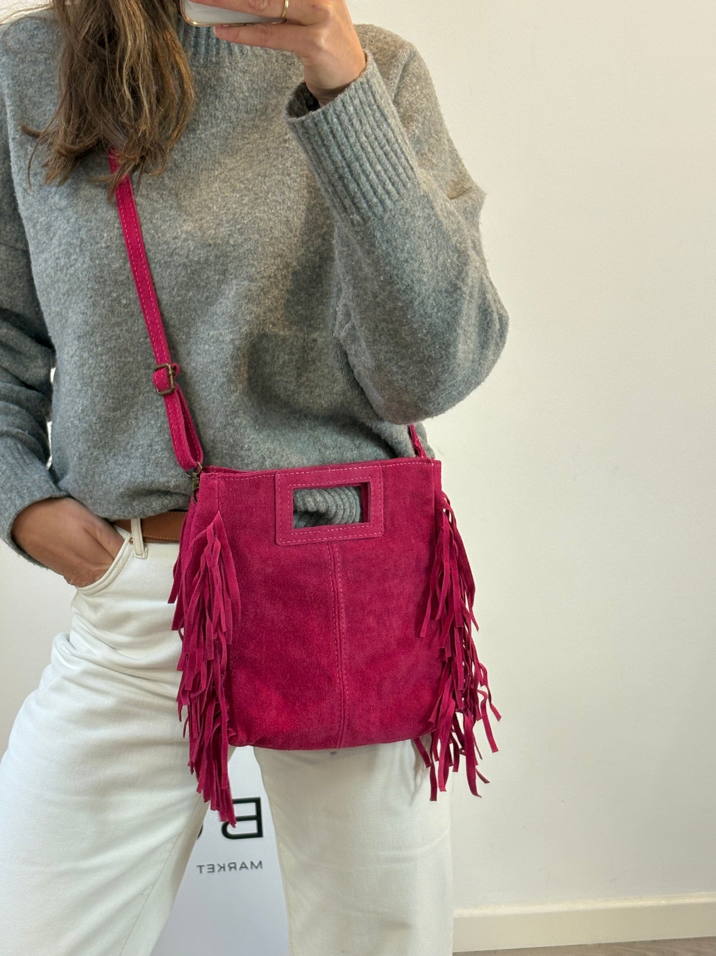 OTRAS. Bolso piel flecos