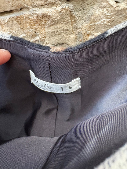 MI&CO. Falda midi rayas con lana