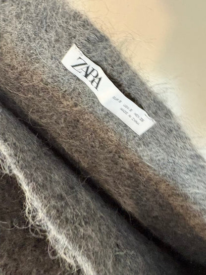 ZARA. Jersey asimétrico gris con alpaca