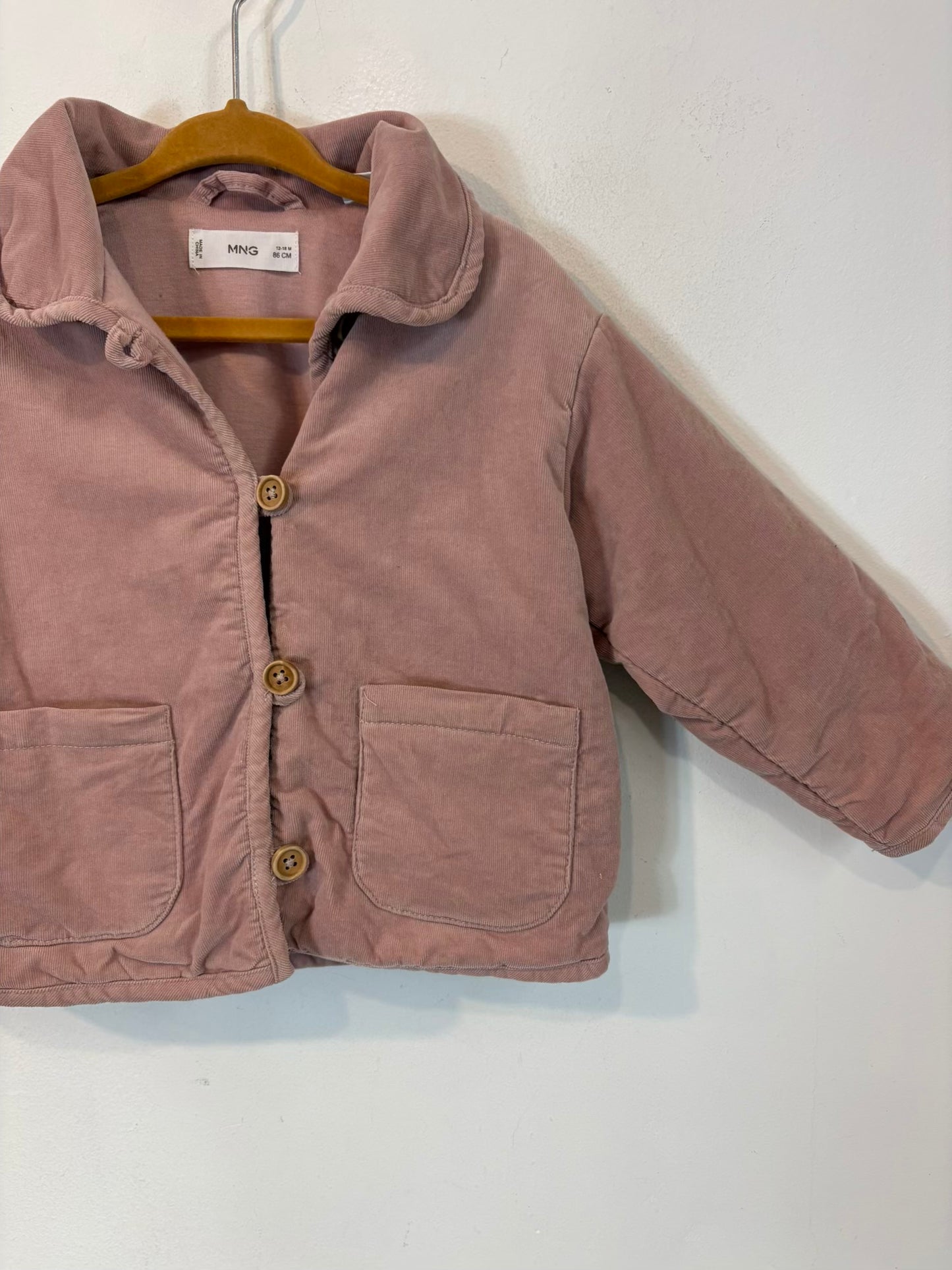 MANGO. Chaqueta rosa textura . T 12-18 meses