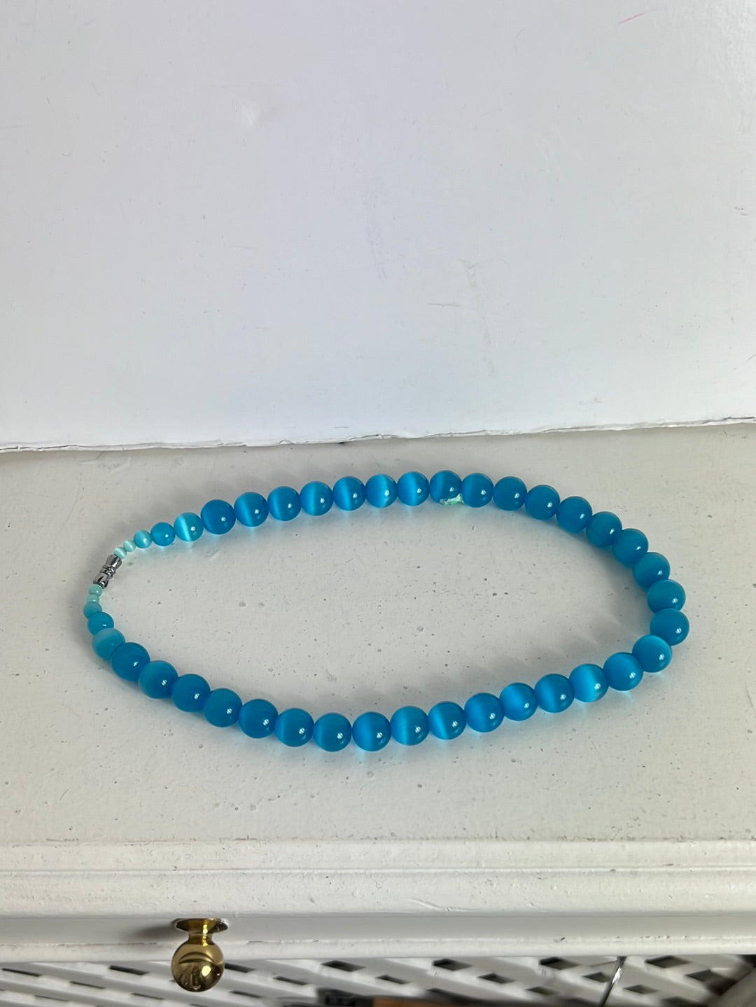 OTHERS. Blue boots necklace