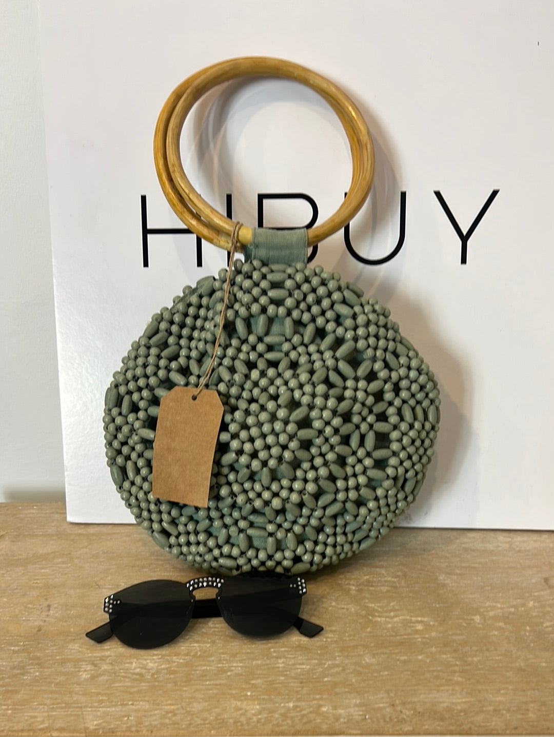 SALVADOR BACHILLER. Bolso redondo detalle asa