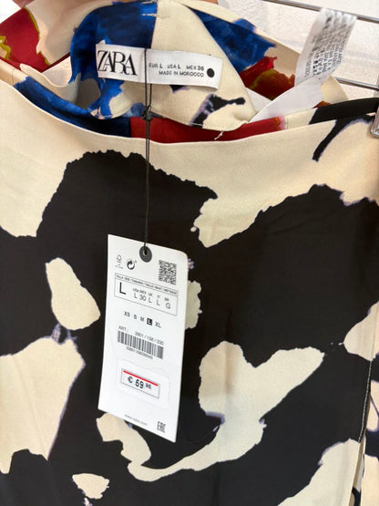 ZARA. Pantalón estampado efecto falda