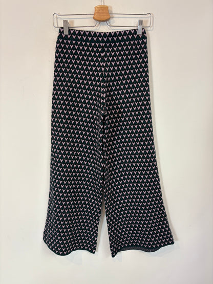 SFERA. Total look with geometric print knitwear. TS