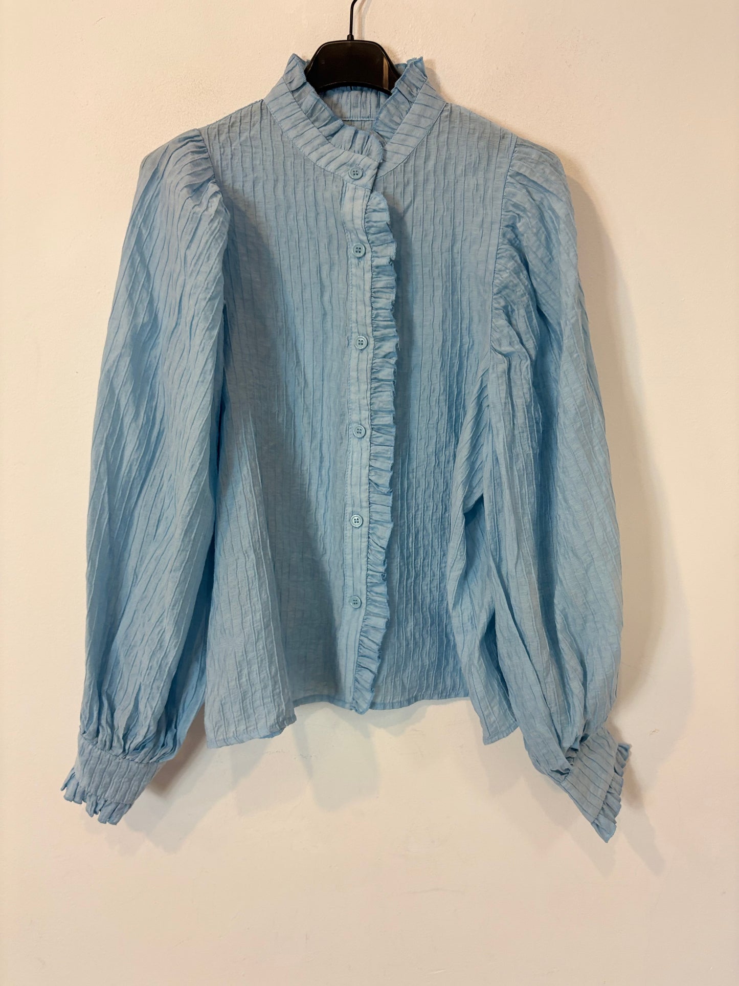 Blusa azul claro textura