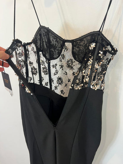 ZARA. Mono negro lentejuelas