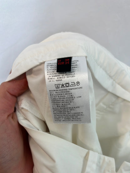 STEFANEL. White wide-leg trousers, size 34