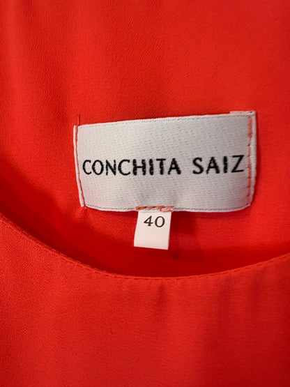 CONCHITA SAINZ. Conjunto Rojo fluido