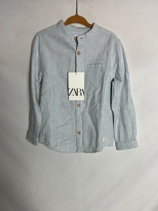 ZARA. Camisa azul claro jaspeada. T 4-5 años