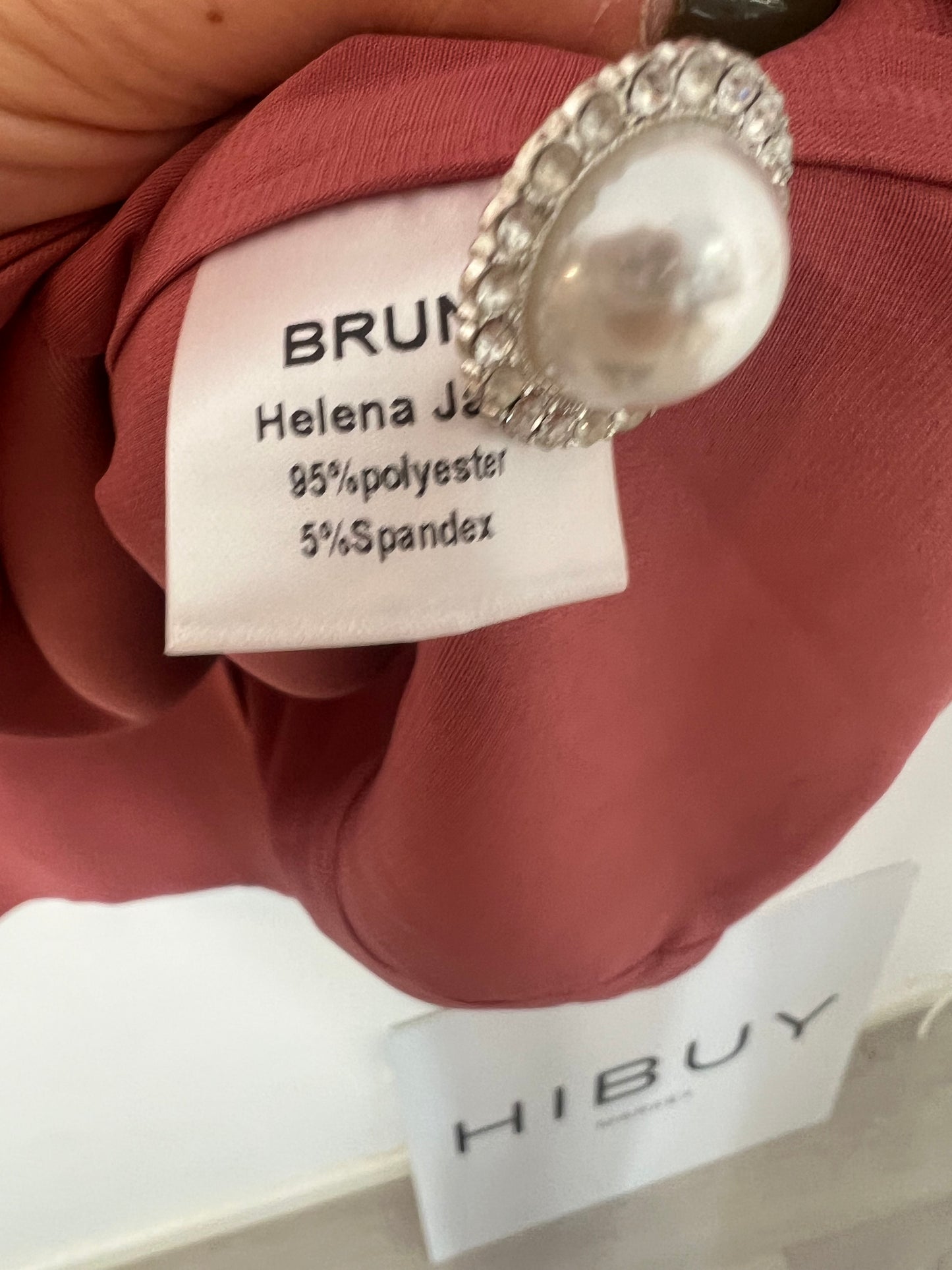 BRUNA. Total dark pink look with details. TS