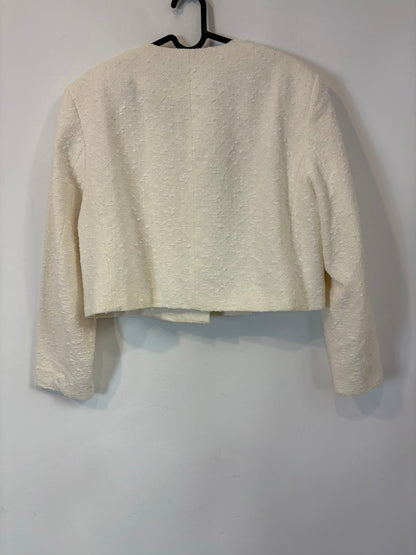 ZARA. Chaqueta tweed cruda